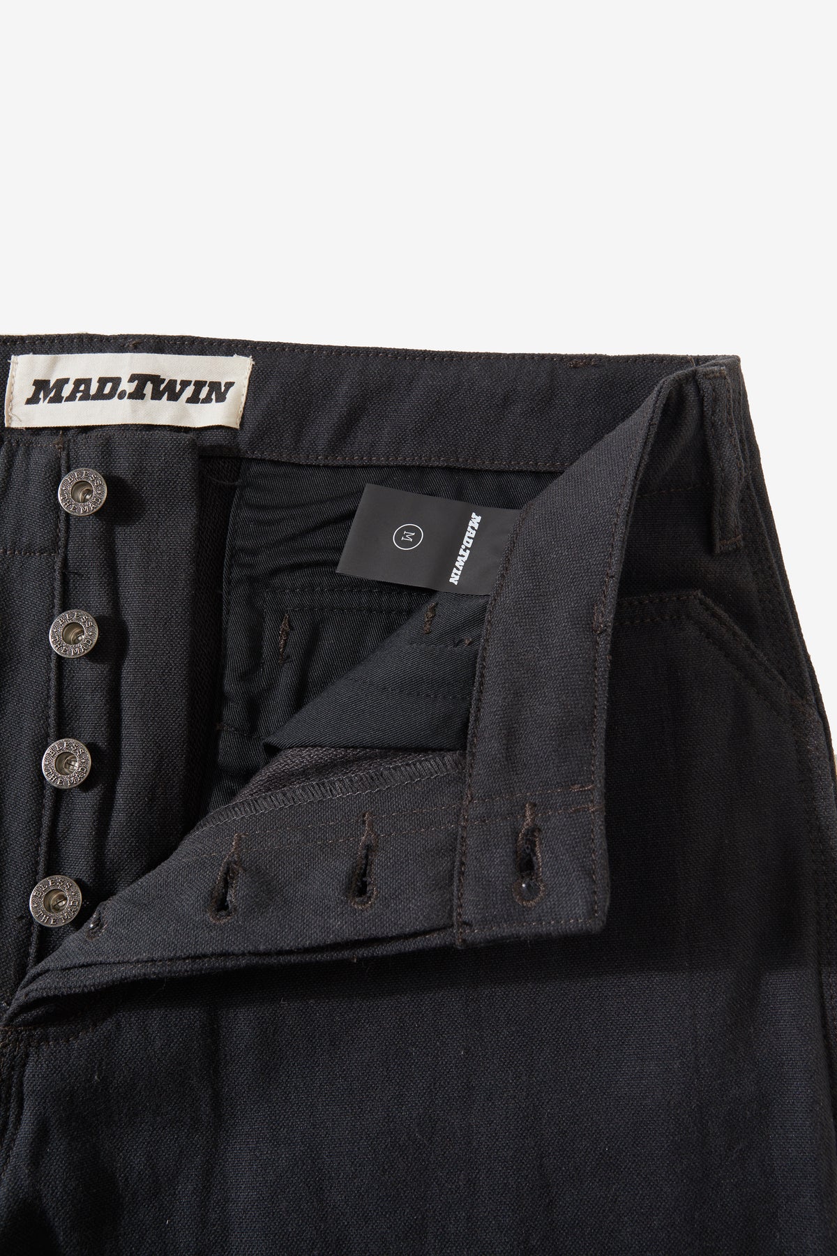 MAD.PROTECT.PANT flap front pockets on charcoal riding pant