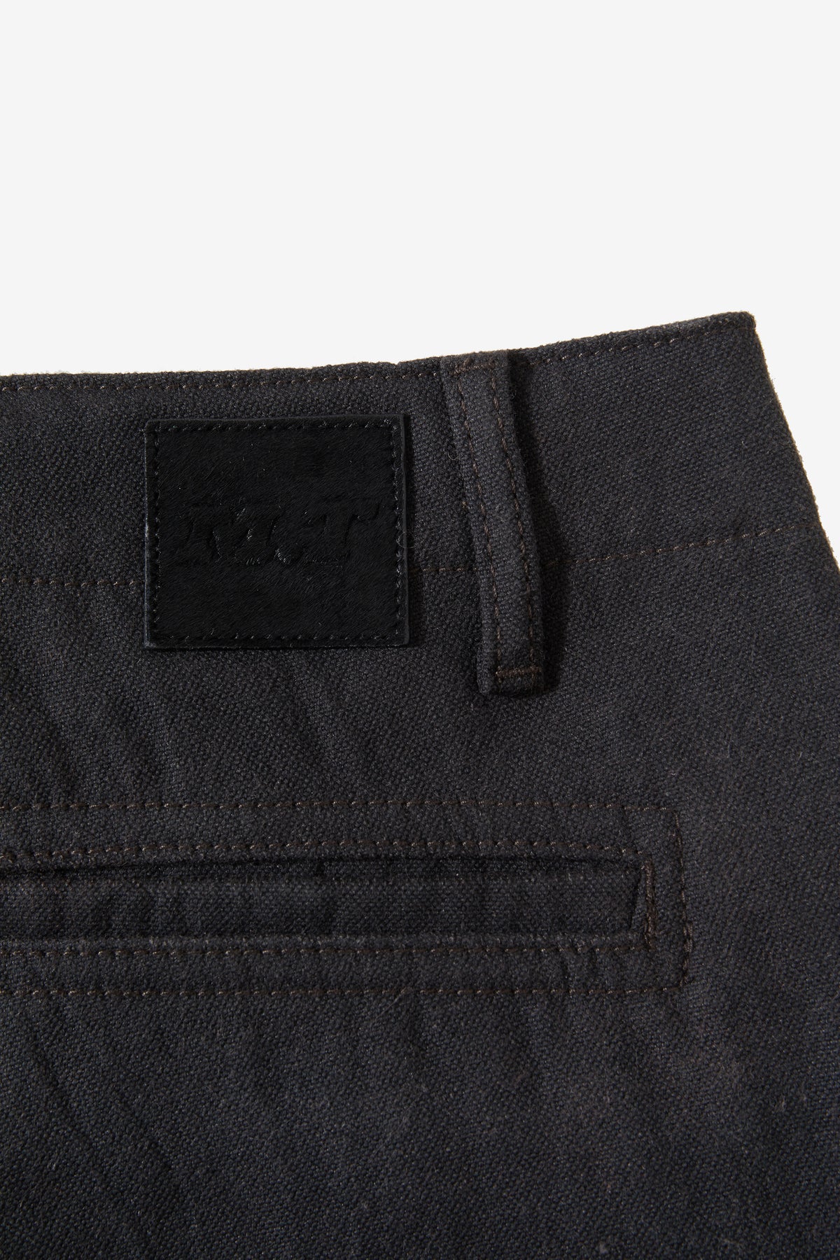 MAD.PROTECT.PANT reinforced waistband and metal ring detail