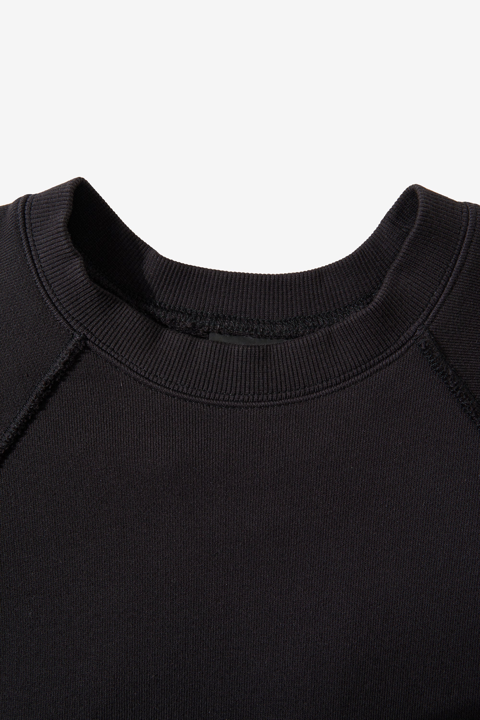 FLAME.CREW cut with a shorter, relaxed 60s fit