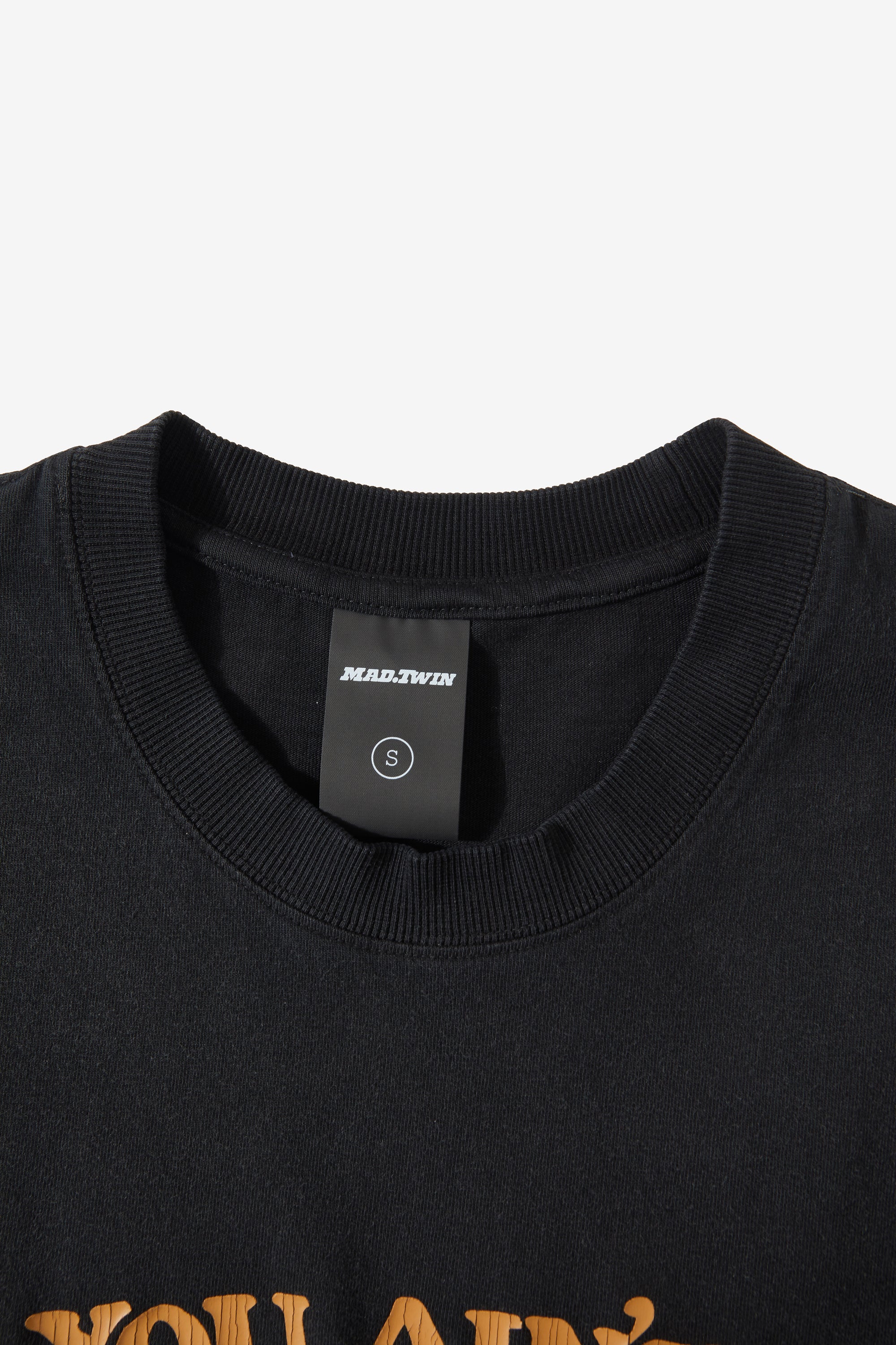 Heavy rib crew neck on the black YOU.AIN'T.TEE