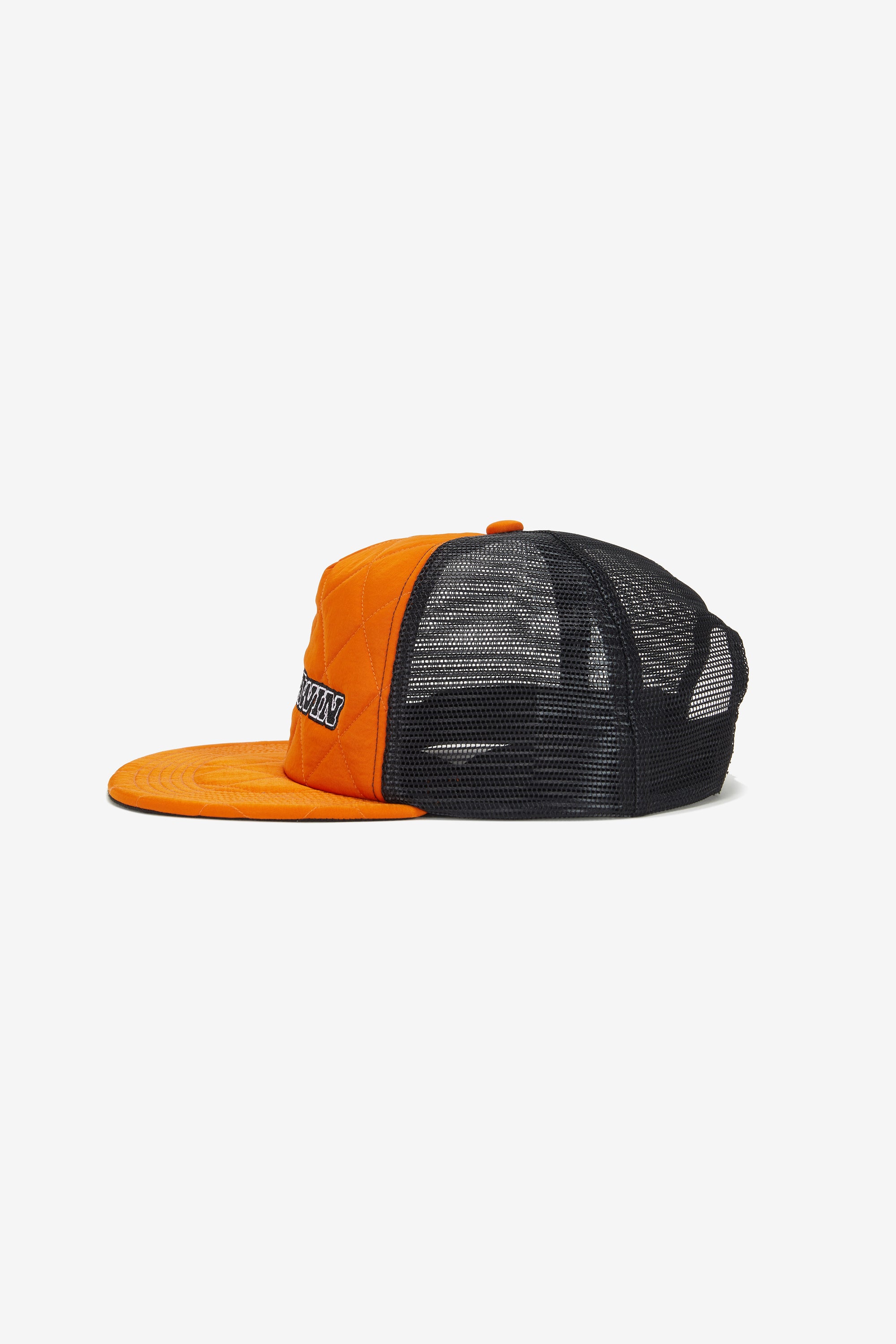 MT.QUILT.HAT in textured orange nylon with a black mesh back